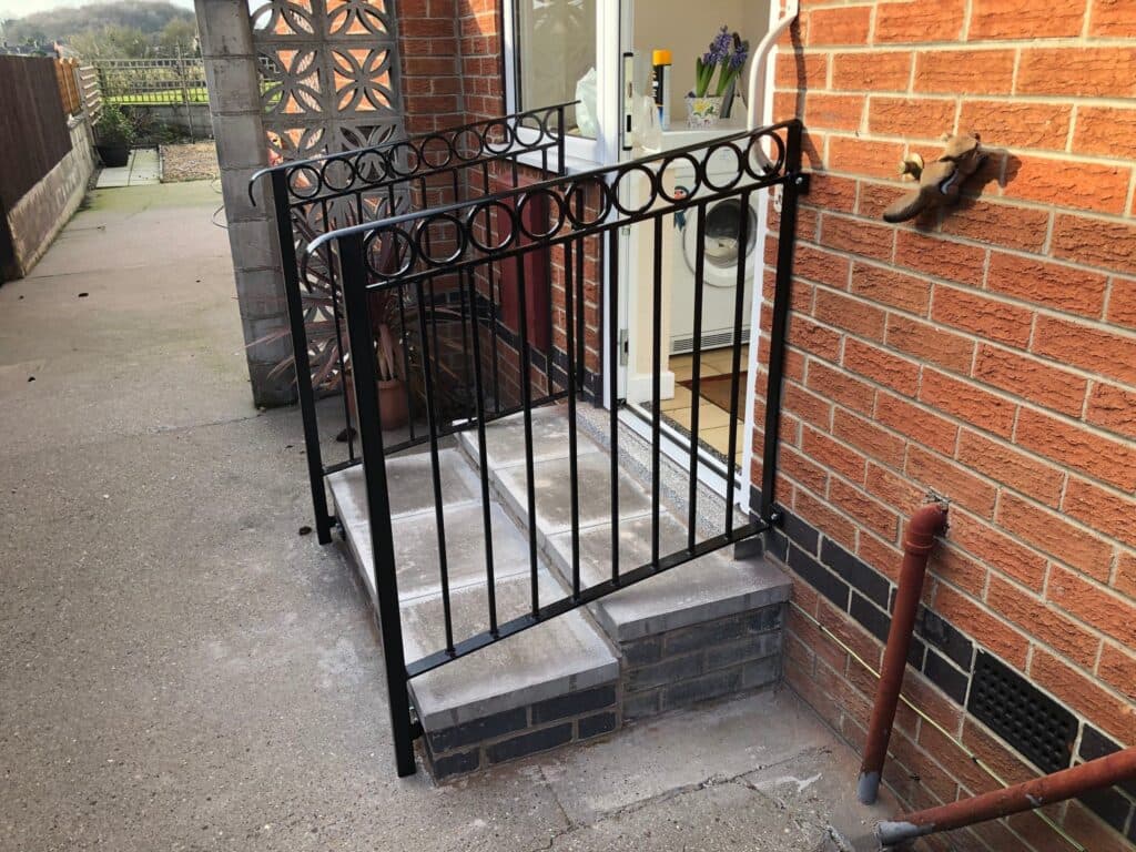 Finished wrought iron railings installed on site